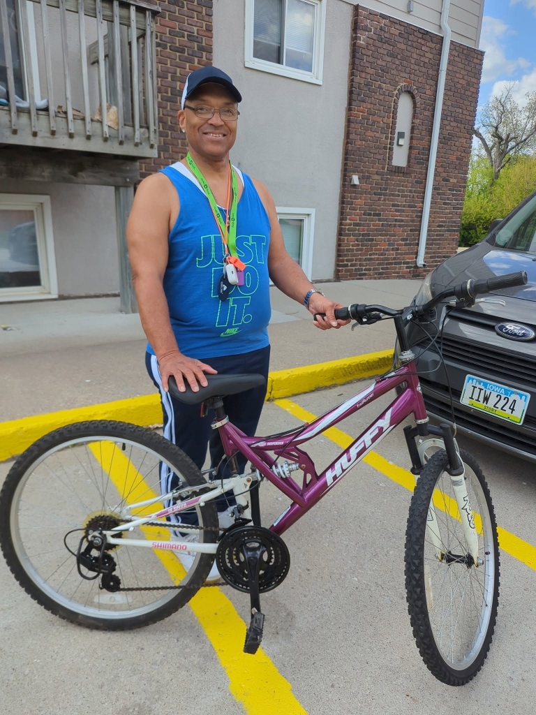 Community recipient with bicycle