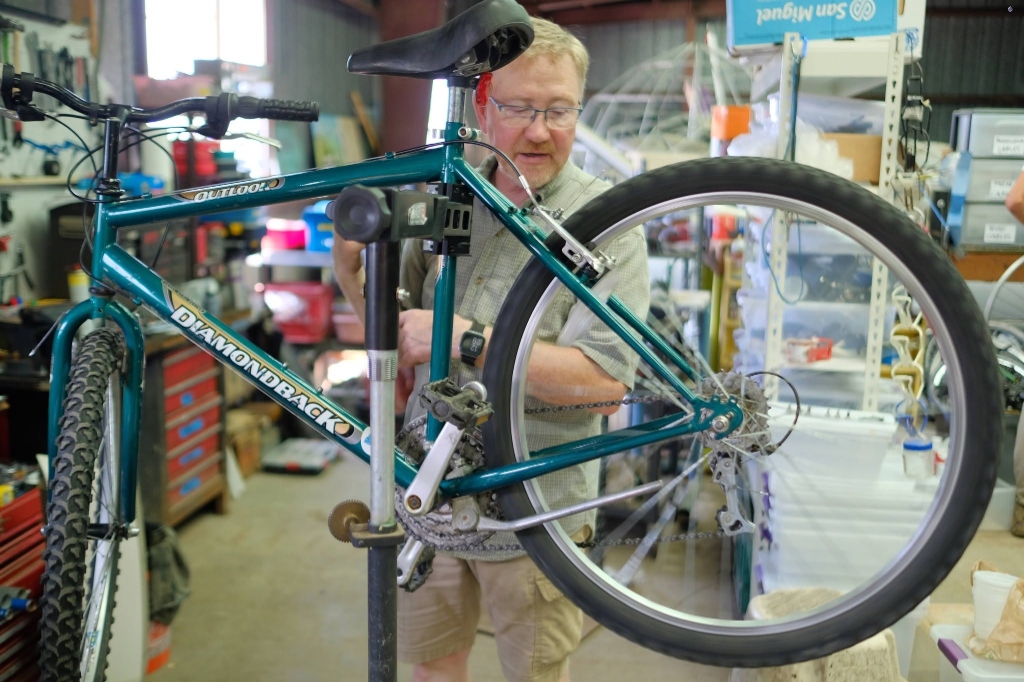 Volunteers working on bicycles
